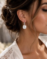 Handmade silver plated leverback earrings featuring 12mm clear Swarovski cushion cut crystals for vintage weddings and bridal wear.