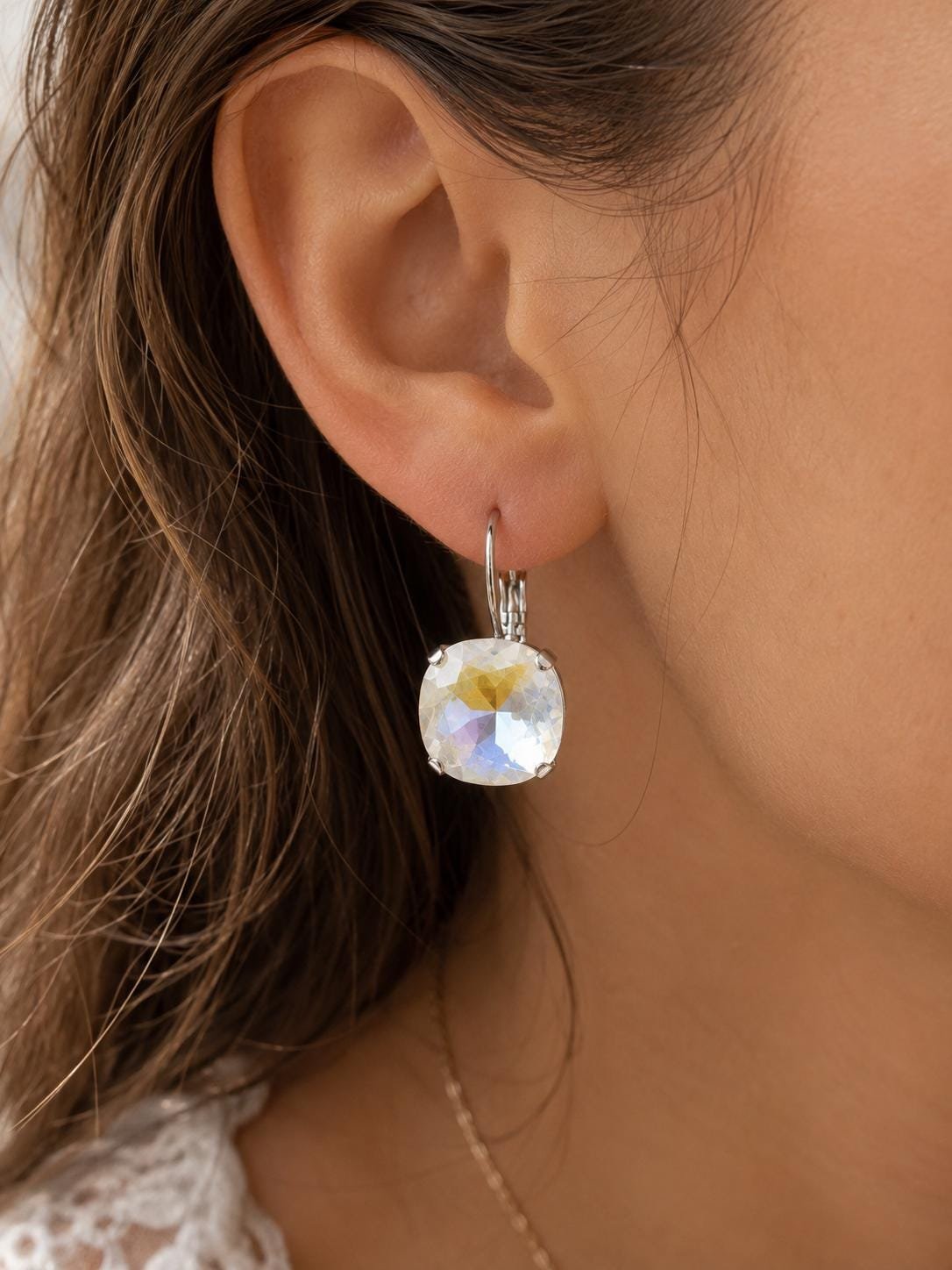 Cushion cut Crystal earrings in polished silver plated leverback settings.