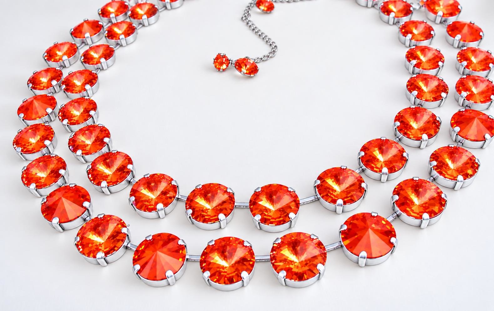 Fiery orange 12mm Swarovski Rivoli crystal bracelet in a silver plated cupchain setting