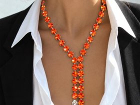  orange Rivoli lariat necklace with clear pear-shaped crystal drops
